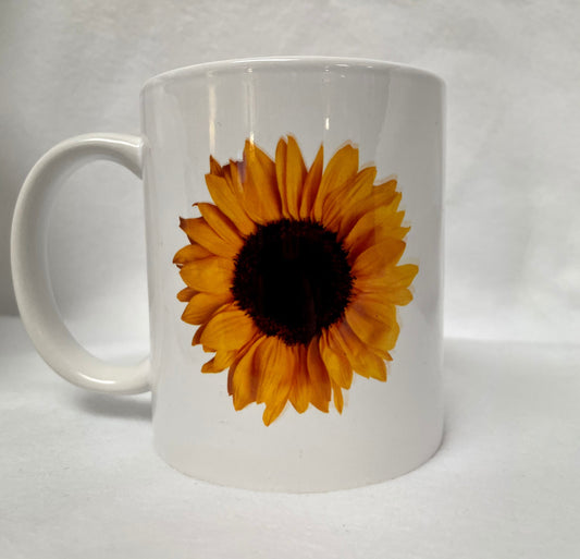 Love Sunflowers? Enjoy your coffee in this 14 ounce ceramic coffee cup!