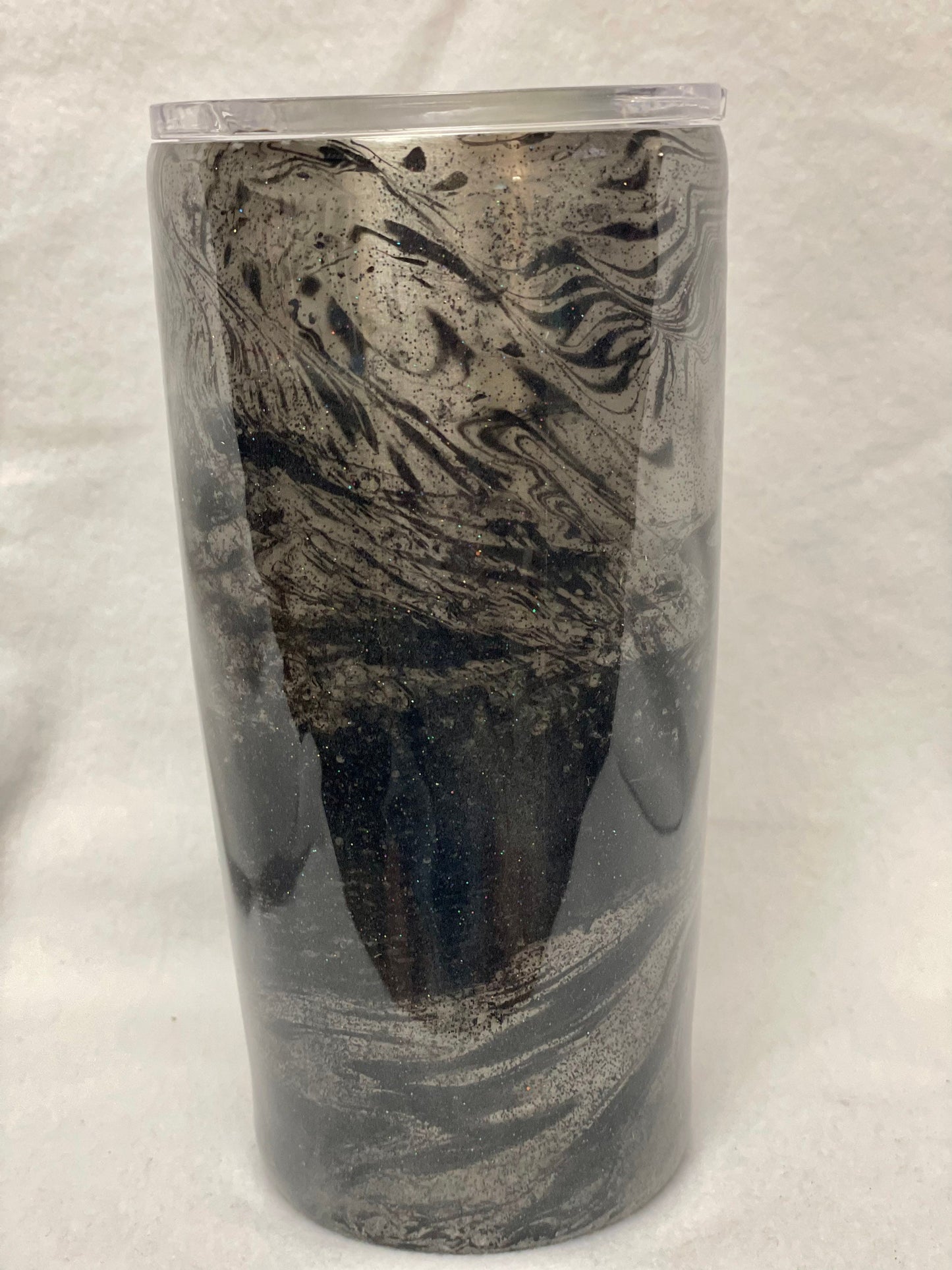 Do you want to personalize your tumbler? Enjoy a beverage in this 20oz Hydro- dipped Tumbler.