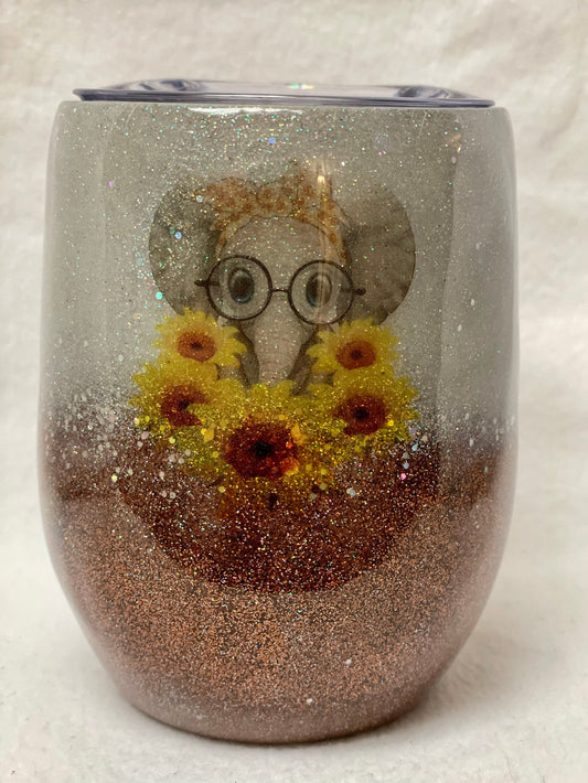Love Elephants! Enjoy a beverage in this 12oz Tumbler.
